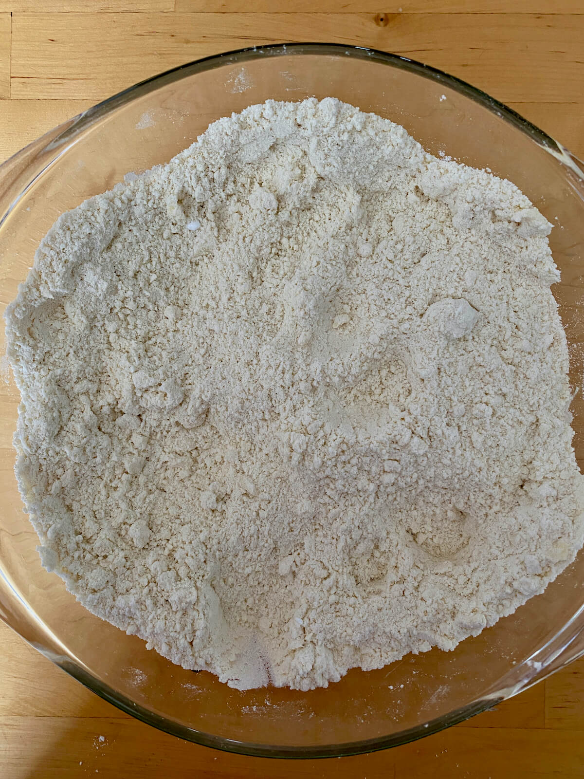 A crumbly mixture of flour, salt, baking soda, sugar, and butter.