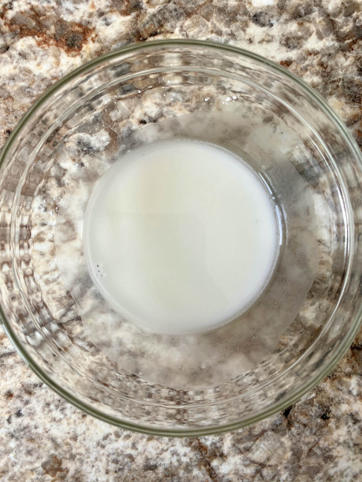 Cornstarch and water whisked together in a small bowl to make a cornstarch slurry.