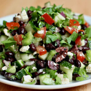 A small plate of Mediterranean black bean salad.