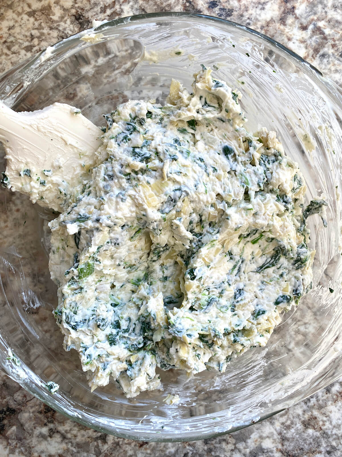 Spinach and artichokes mixed into the cream cheese dip base.