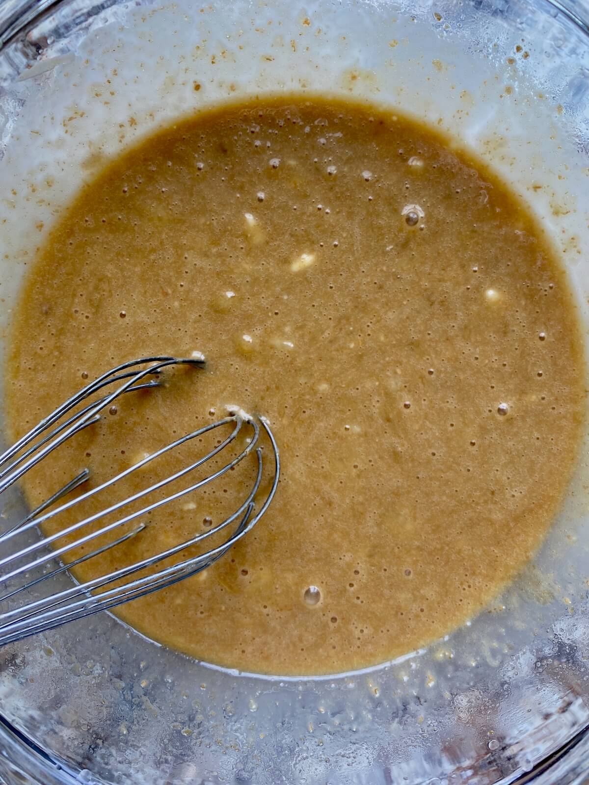The wet ingredients mixed together in a bowl.
