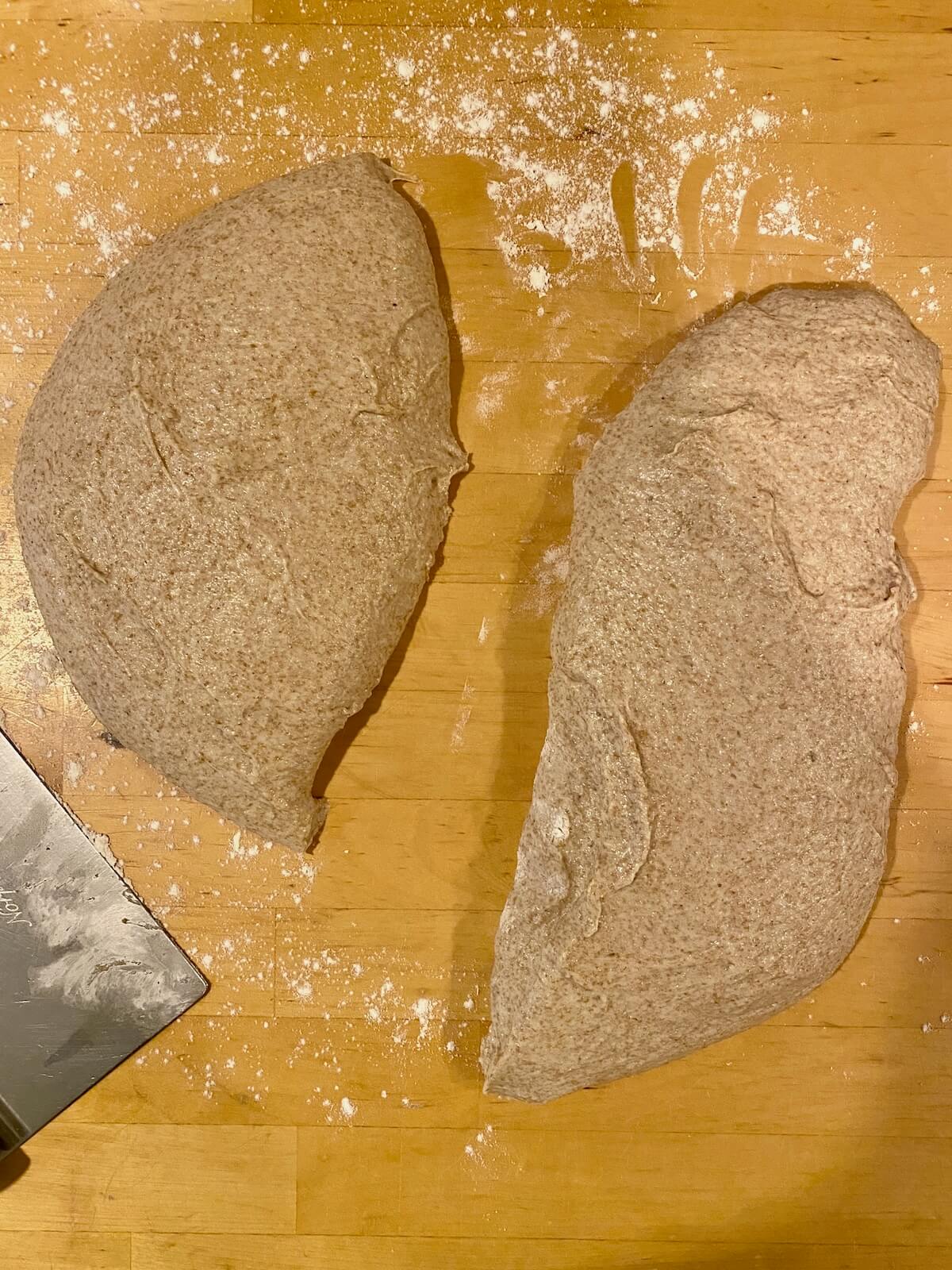 The dough split in two in a floured countertop.