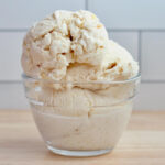 A small glass bowl of sourdough ice cream.
