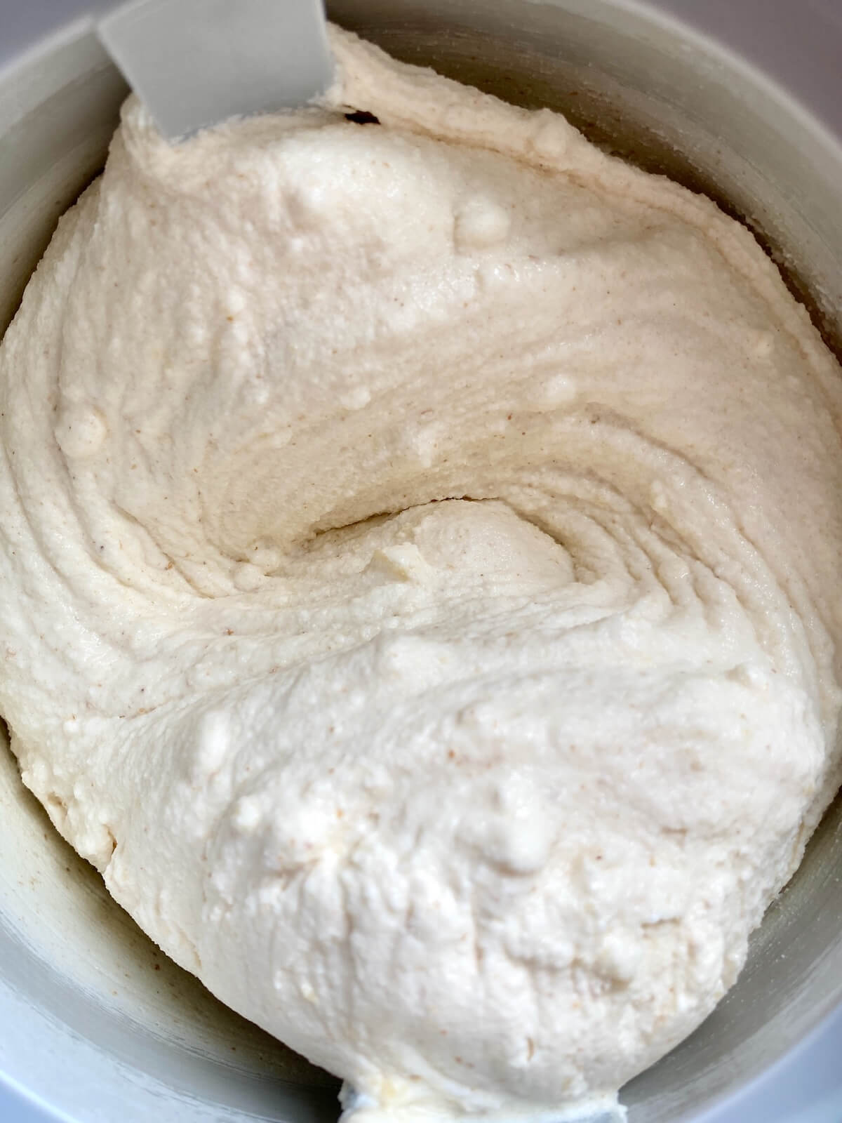 Sourdough ice cream in an ice cream machine.