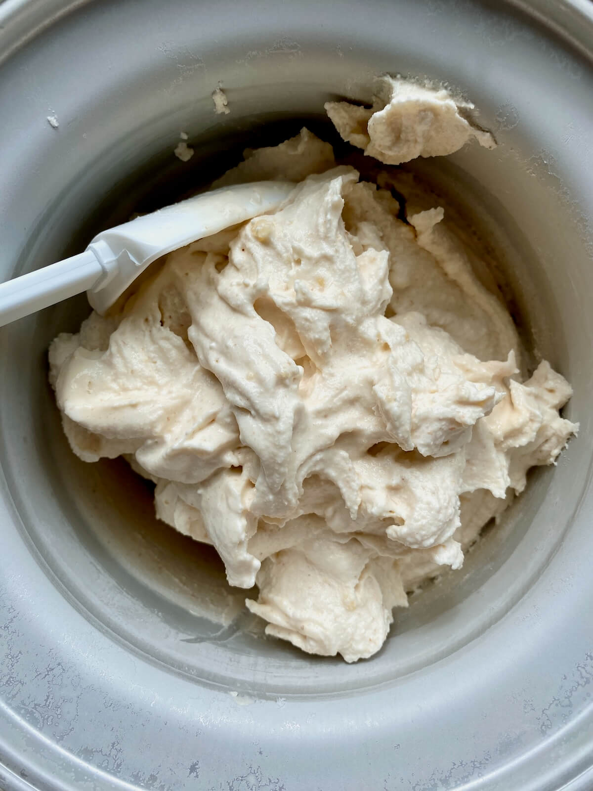The finished sourdough ice cream in the ice cream machine.