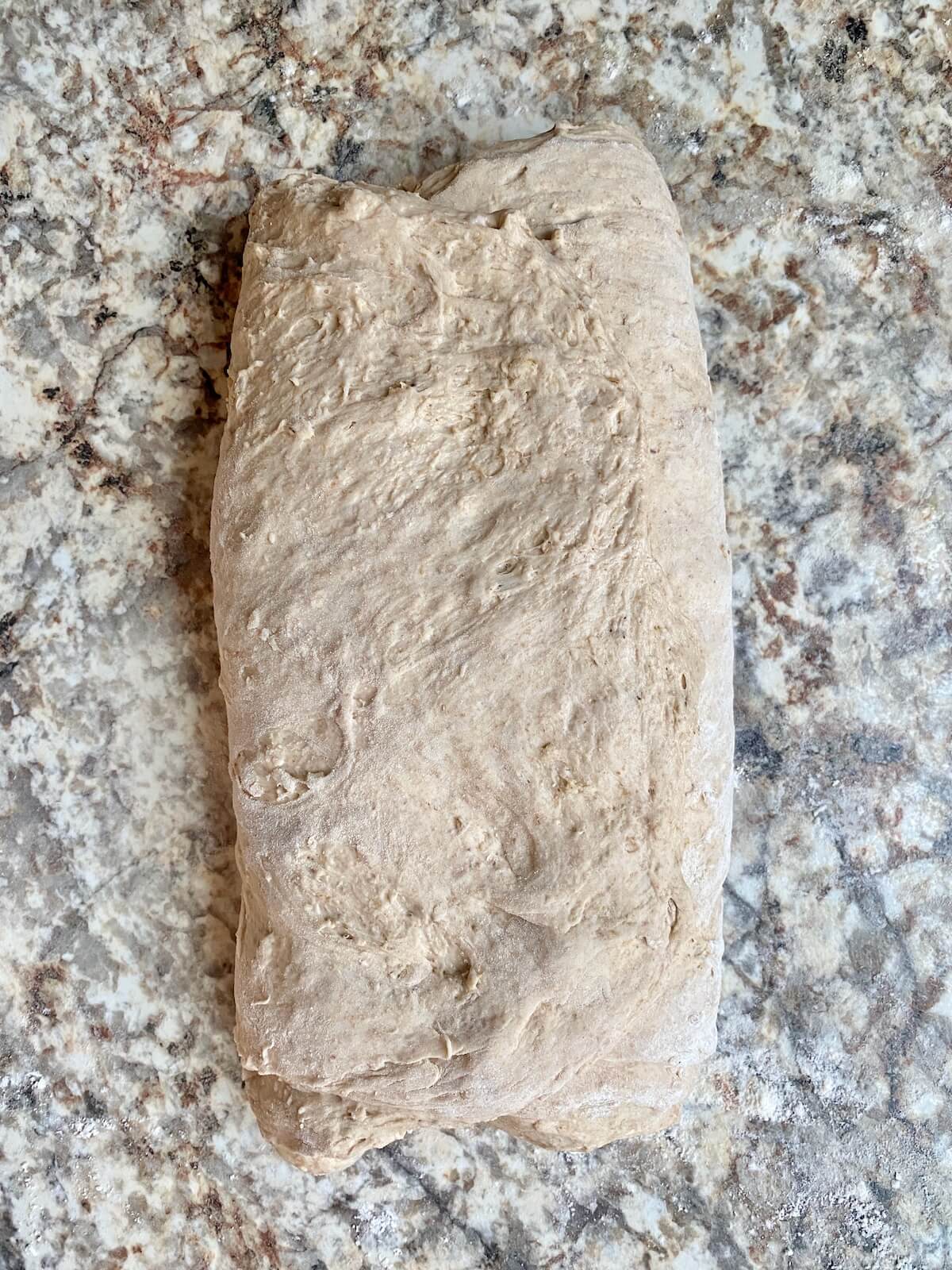 The dough folded into thirds like a letter during the shaping process.