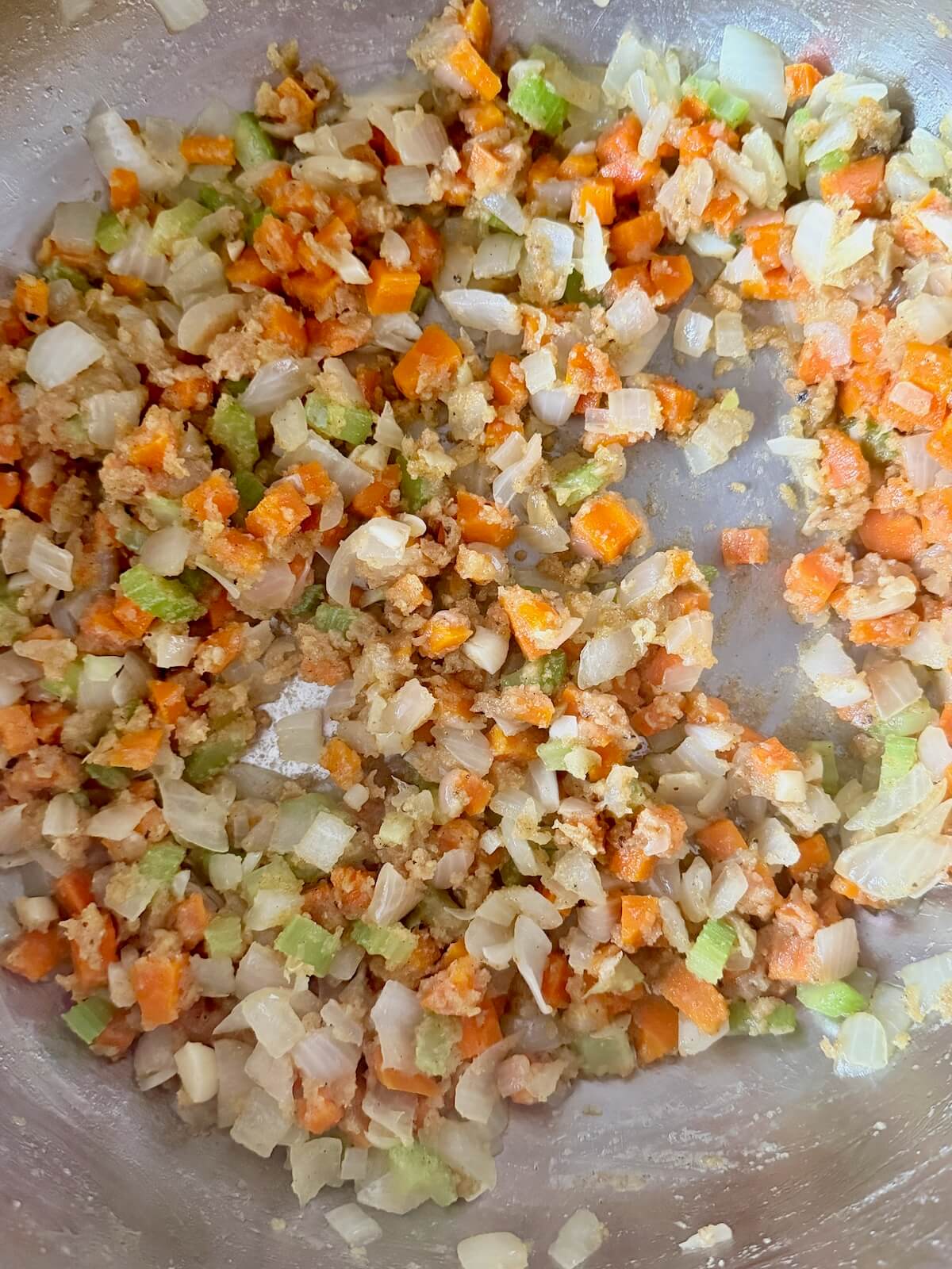 Sourdough discard mixed into the sautรฉed vegetables as a thickening agent.
