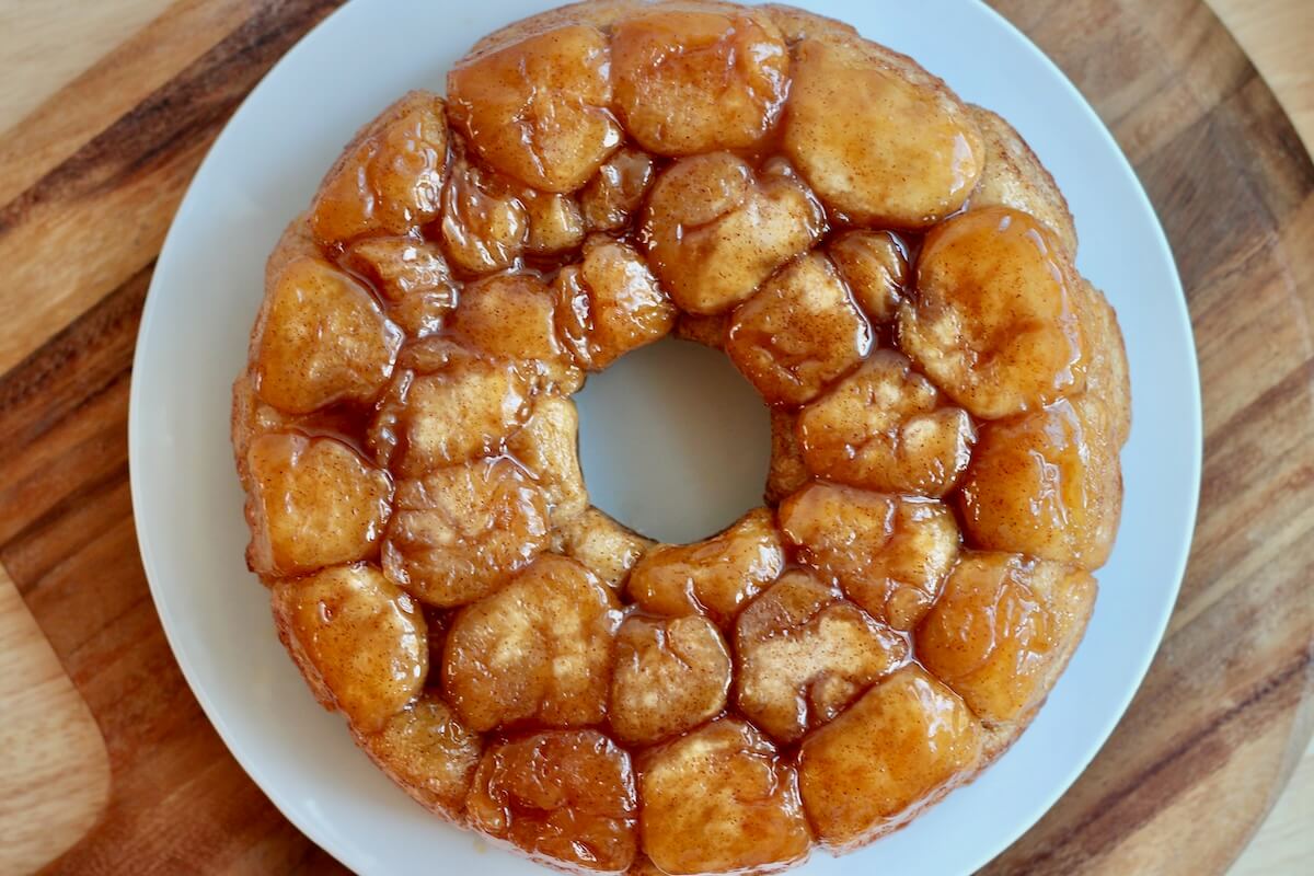 A loaf of sourdough monkey bread on a white plate.
