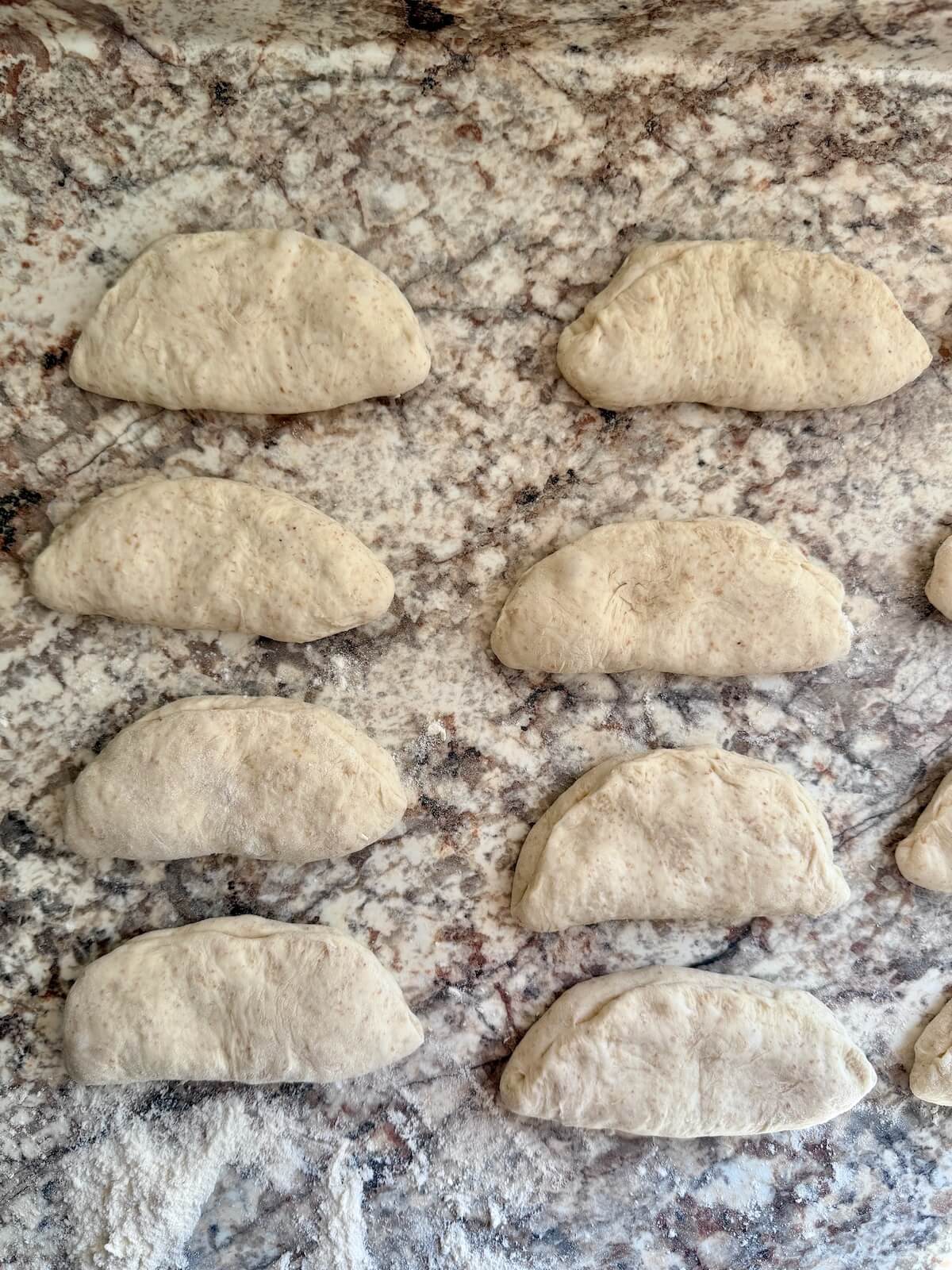 All of the pieces of dough filled with garlic butter.