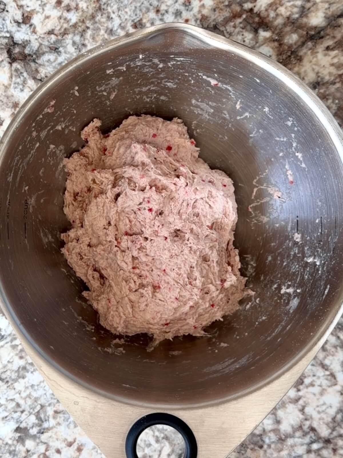 Sourdough bread dough with freeze-dried strawberry powder mixed into it to make it pink.