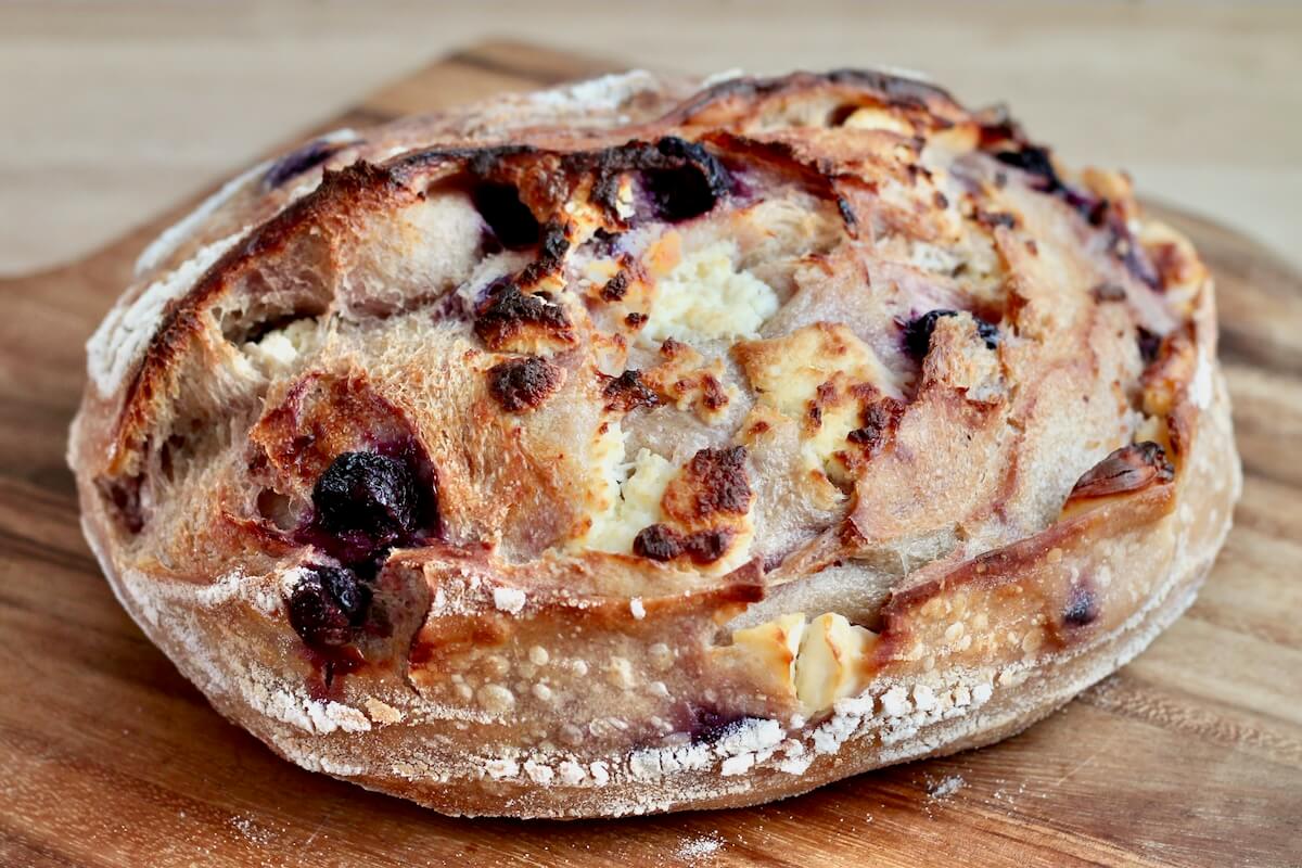 A whole loaf of blueberry cream cheese sourdough bread.