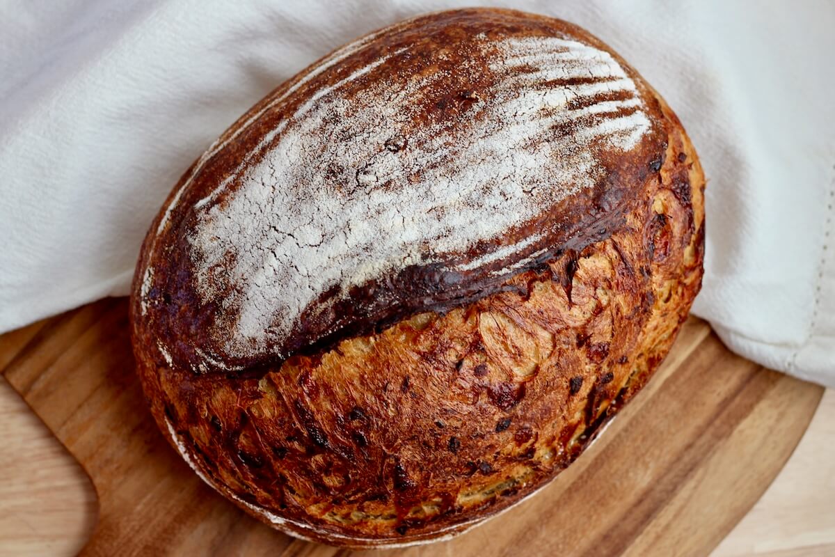 A whole loaf of French onion soup sourdough bread.