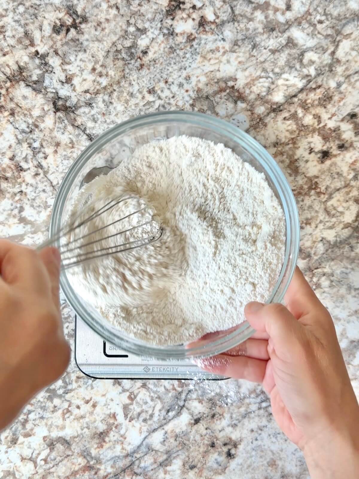 The dry ingredients being whisked together in a bowl.