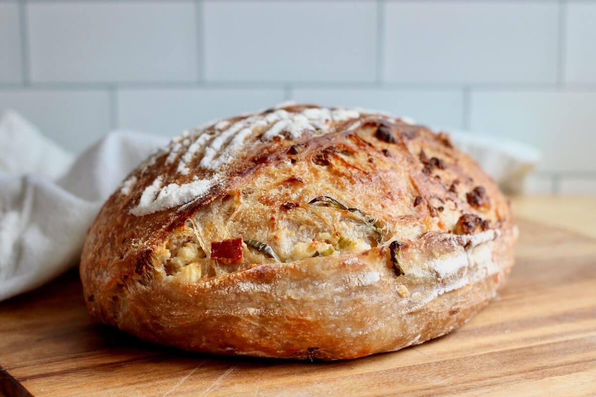 A whole loaf of jalapeƱo popper sourdough bread.
