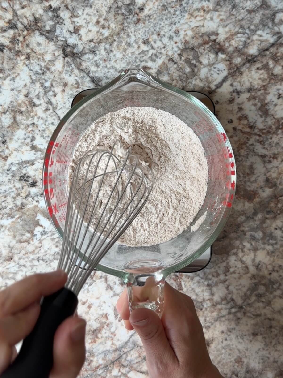 The dry ingredients whisked together in a bowl.