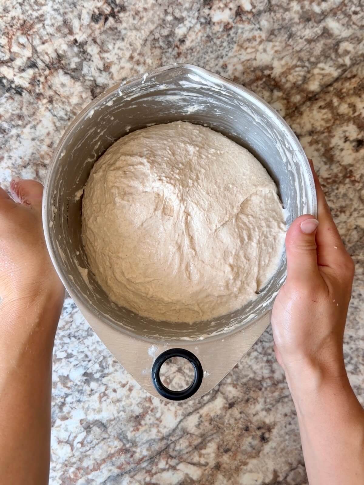 Stretched and folded sourdough discard focaccia dough in a bowl.