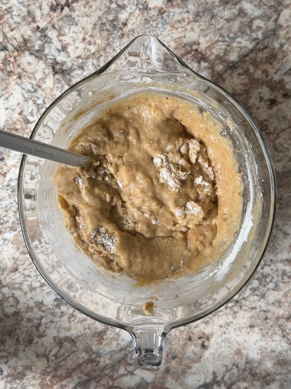 Brown butter sourdough banana bread batter in a large bowl.