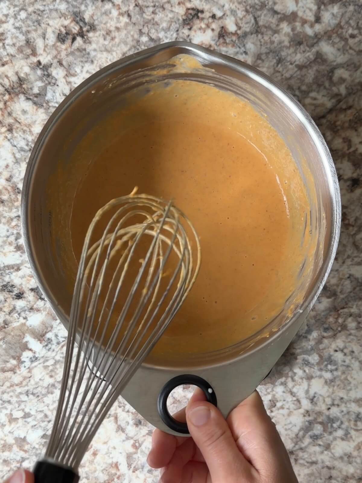 Pumpkin puree whisked with sourdough starter, whole milk, and brown sugar.